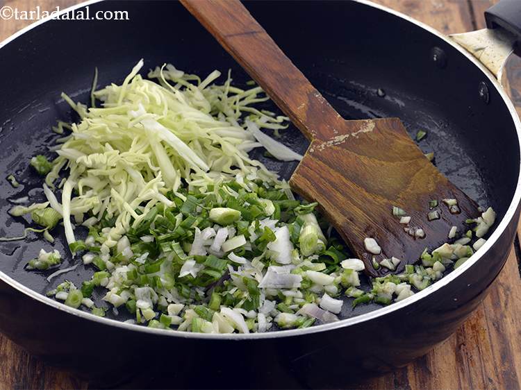 Step 44 – Add the cabbage for their crunchiness.