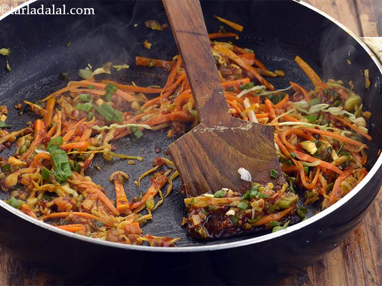 Step 31 – Mix well and cook on a medium flame for 1 minute.