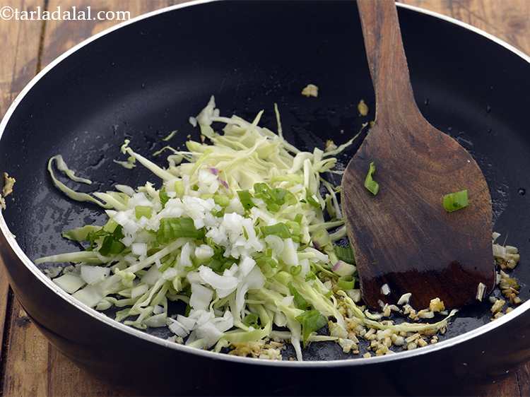 Step 45 – Also, add spring onions.