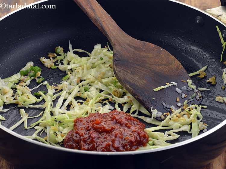 Step 47 – Add the schezuan sauce. This is the key ingredient of our recipe.