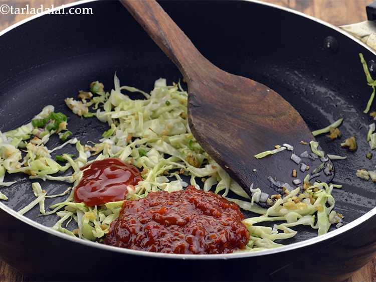 Step 48 – Add the tomato ketchup. It gives mild sweetness present in Indo-Chinese recipes.