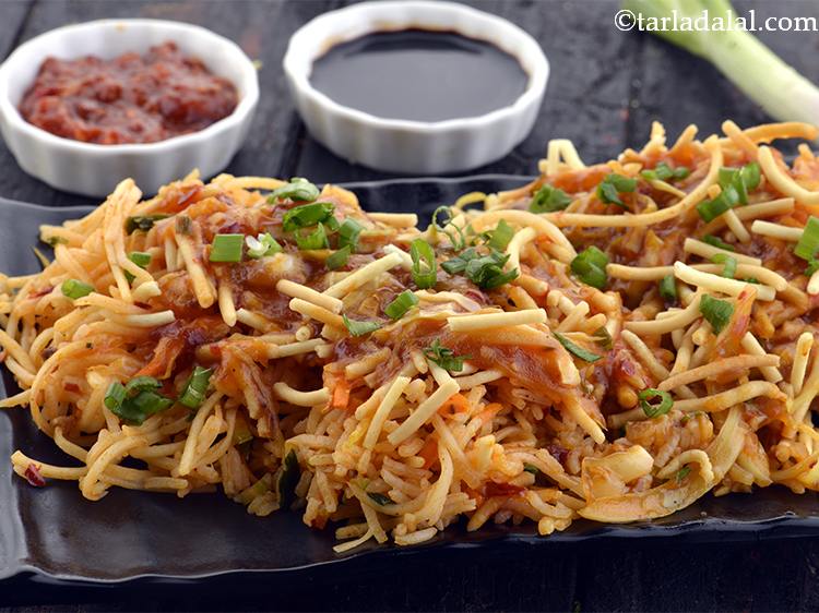 Step 59 – Garnish with spring onions. Serve the&nbsp;<strong>triple schezwan rice | triple schezwan fried rice | Mumbai …