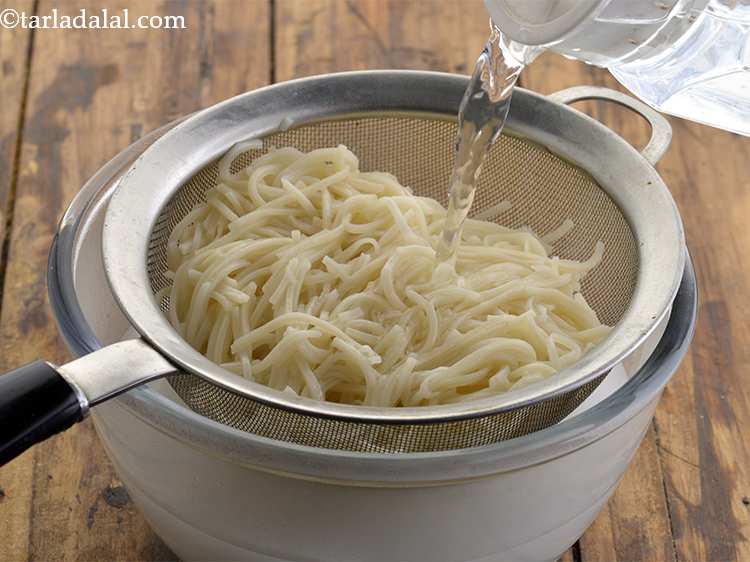 Step 7 – Refresh the noodles under cold water. This ensures that they stop cooking.