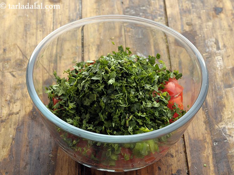 Step 104 – Add&nbsp;1 tbsp&nbsp;finely&nbsp;<a href="https://www.tarladalal.com/glossary-chopped-coriander-783i">chopped coriander (dhania)</a>.