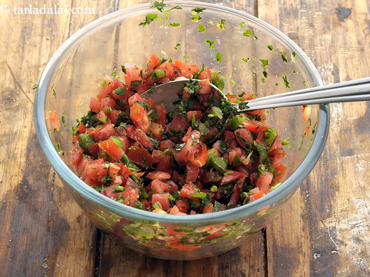 Step 109 – Mix well and mash the salsa slightly with the back of a spoon.