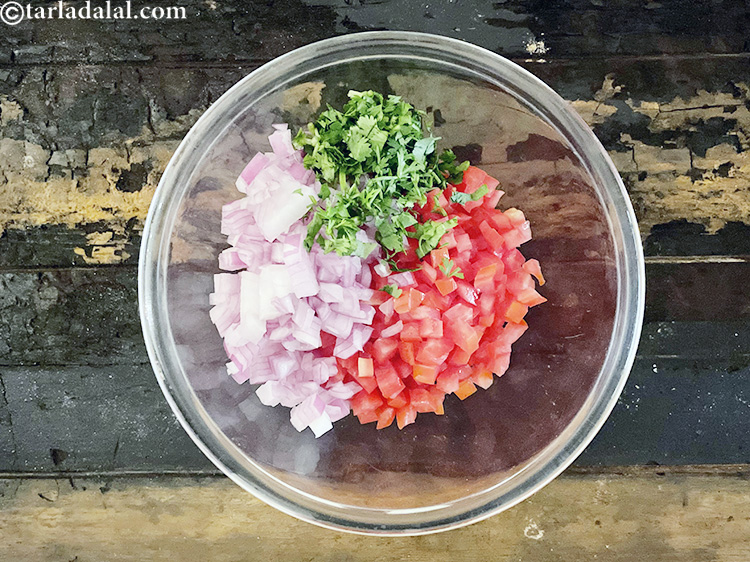 Step 7 – Add&nbsp;<meta charset="UTF-8" />1 tbsp&nbsp;finely&nbsp;<a href="glossary-chopped-coriander-783i">chopped coriander (dhania)</a>.