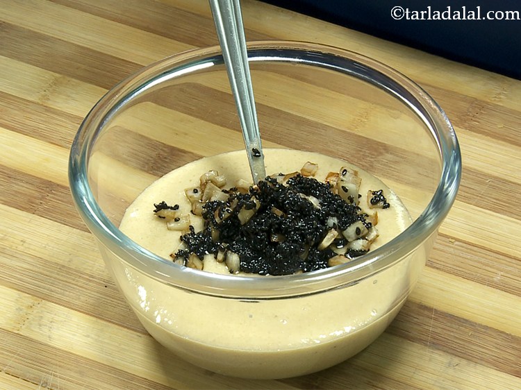 Step 15 – Once cooled add the coconut sesame mixture to the rice jaggery mixture. They give a …