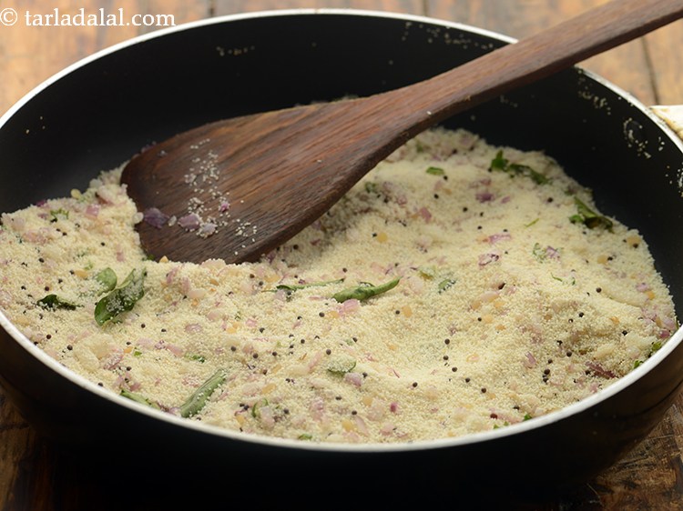 Step 11 – Saute on slow flame for another 2-3 minutes. Semolina would change its color and turn …