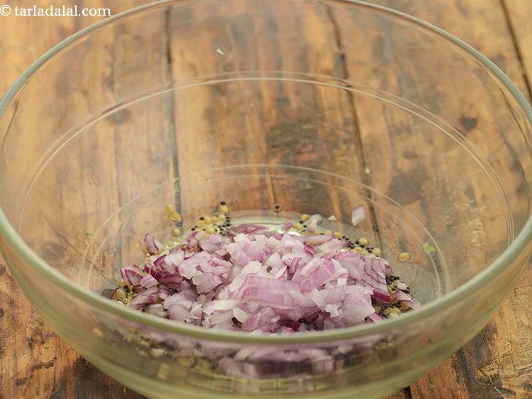 Step 9 – Add onions. Onions provide desired flavor and crunch to the <strong>upma</strong>.&nbsp;