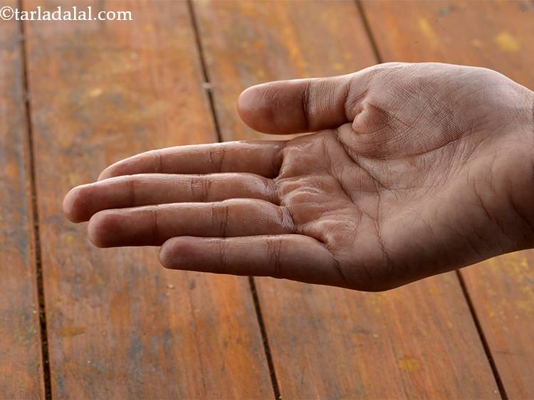 Step 16 – Grease your fingers with a little ghee.