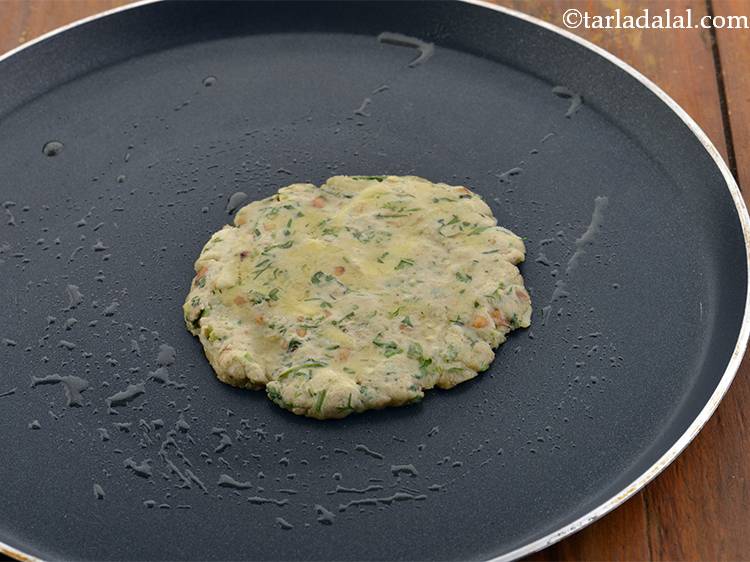 Step 18 – Cook on one side using about &frac12; tsp ghee.&nbsp;