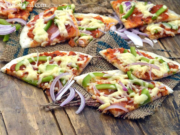 Step 12 – Cut into 4 equal pieces and serve <strong>uttapam pizza |&nbsp;tava uttapam pizza recipe |&nbsp;uttapam pizza …