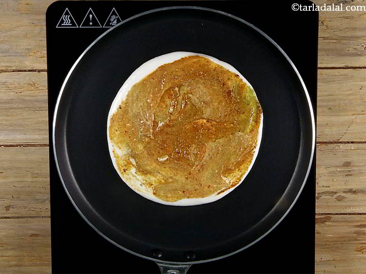 Step 10 – Spread both the chutney evenly over it.