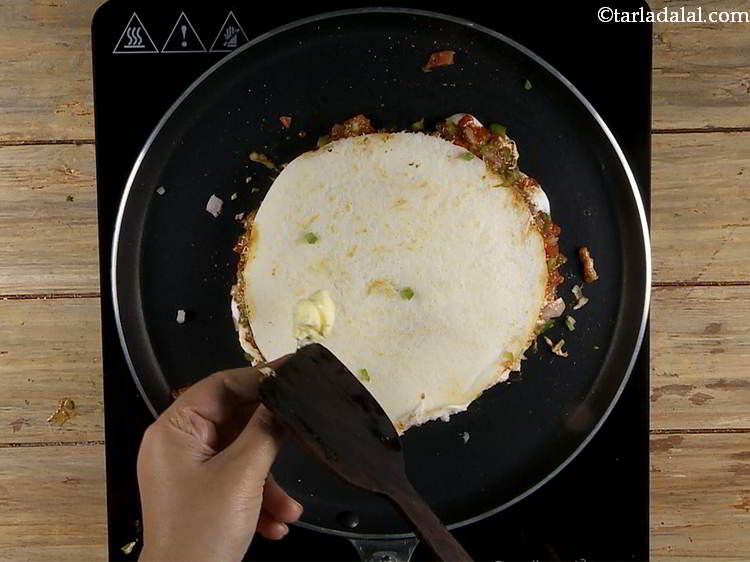 Step 23 – Spread 1 tsp of butter evenly on top.