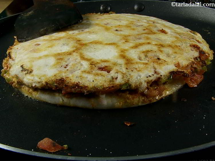 Step 26 – Again spread 1 tsp of butter evenly on top.