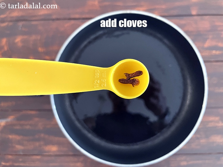 Step 10 – Add&nbsp;<meta charset="UTF-8" />2&nbsp;<a href="glossary-cloves-laung-lavang-322i">cloves (laung / lavang)</a>.