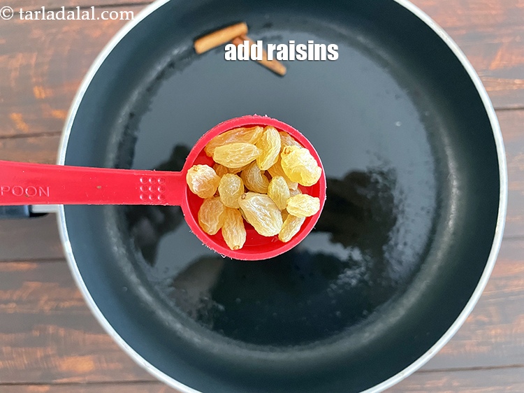 Step 12 – Add&nbsp;<meta charset="UTF-8" />1 tbsp&nbsp;<a href="glossary-raisins-kishmish-kismis-597i">raisins (kismis)</a>.