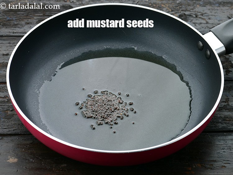 Step 20 – Add 1/2 tsp&nbsp;<a href="https://www.tarladalal.com/glossary-mustard-seeds-sarson-rai-sarson-ke-beej-525i">mustard seeds ( rai / sarson)</a>.&nbsp;