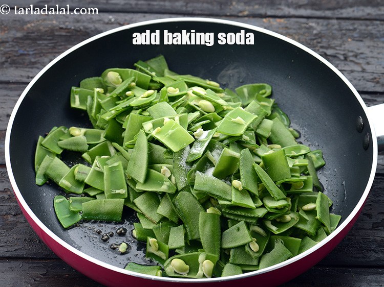 Step 24 – Add a pinch of&nbsp;<a href="https://www.tarladalal.com/glossary-baking-soda-soda-bi-carb-615i">baking soda</a>, this added to make the valor cook faster and …