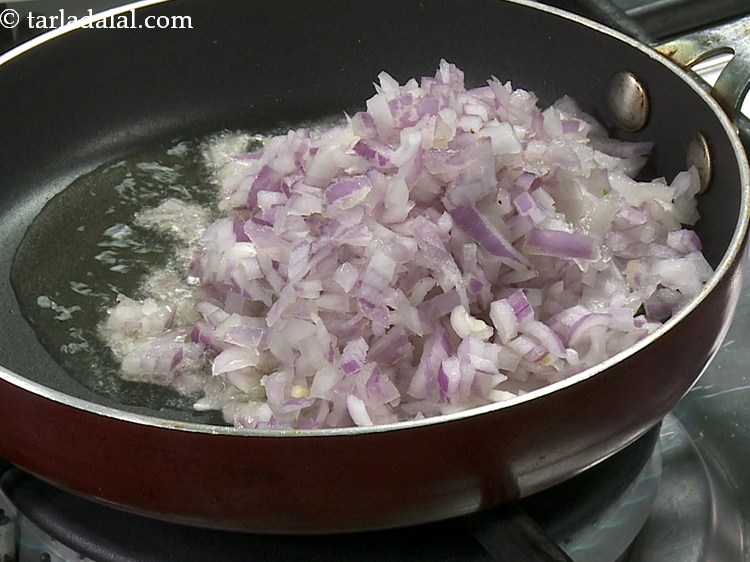 Step 2 – Once the oil is hot, add the onions.