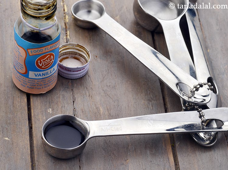 Step 6 – Add 1 tsp&nbsp;<a href="https://www.tarladalal.com/glossary-vanilla-essence-406i">vanilla essence</a>.