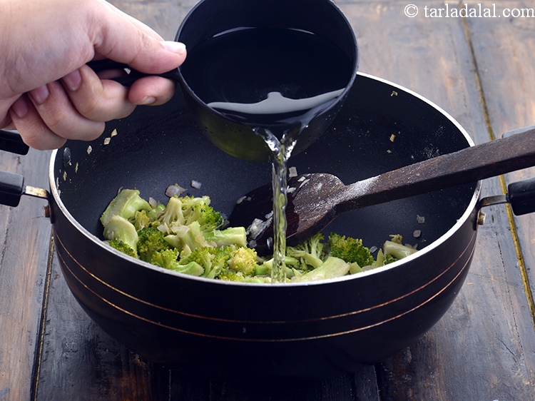 Step 11 – Add 2 cups of water to the broccoli.