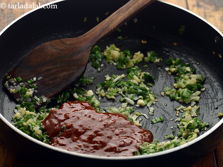 Step 21 – Add the schezuan sauce and cook on a high flame for 30 seconds, while stirring …