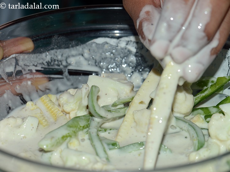 Step 12 – Dip each vegetable strip into the batter.