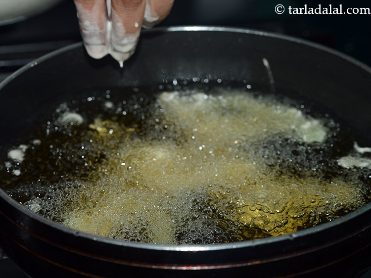 Step 13 – Carefully drop the vegetables one by one in the hot oil.