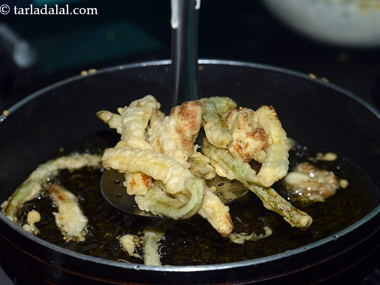 Step 14 – Deep-fry till they turn golden brown in colour from all the sides.