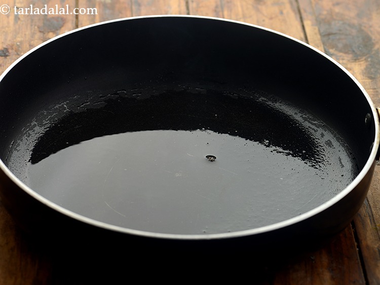 Step 17 – To make veg crispy, heat the oil in a non-stick kadhai or a broad non-stick …
