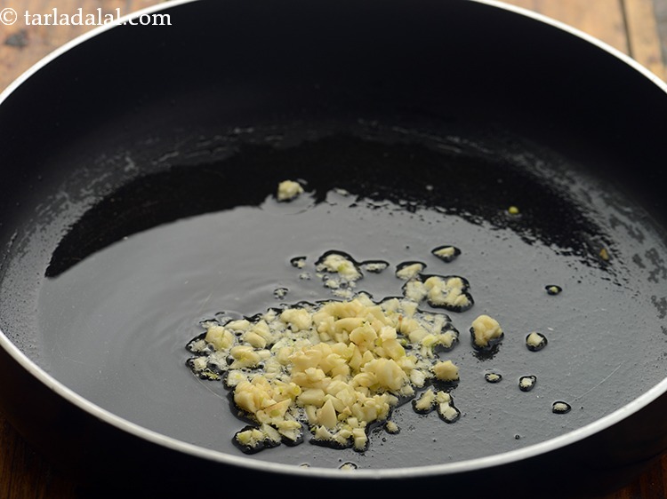 Step 18 – Add the garlic and saut&eacute; on a high flame for few seconds.