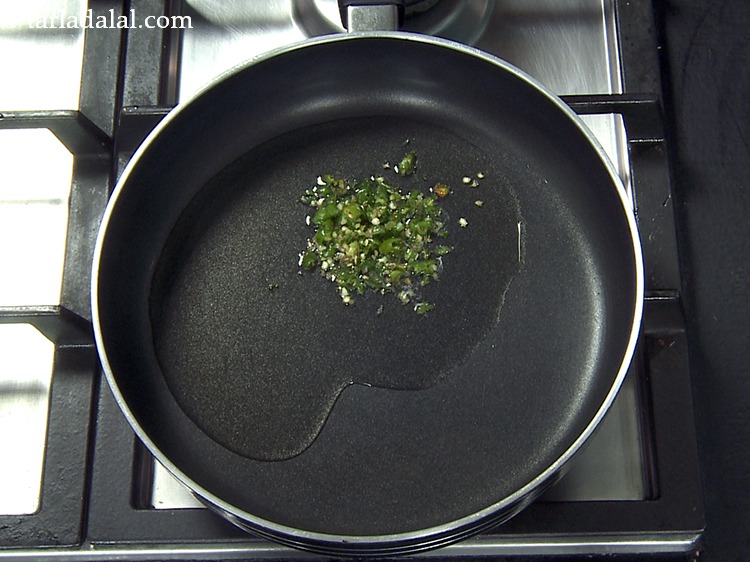 स्टेप 26 – २ टी-स्पून बारीक <a href=""https://www.tarladalal.com/-0r"">कटी हुई हरी मिर्च</a> डालें। हमारा …