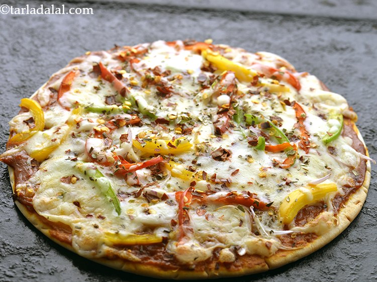 Step 68 – Take out once&nbsp;<strong>vegetable pizza</strong> is<strong>&nbsp;</strong>cooked in the oven, cut into wedges and serve.