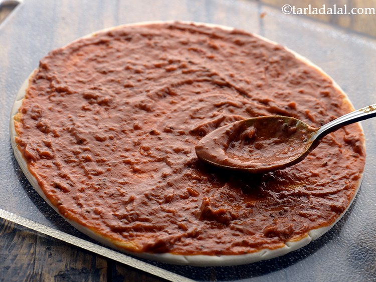 Step 53 – Spread it evenly with the help of a spoon.