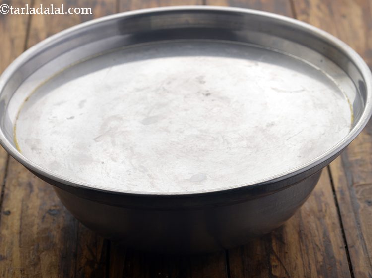 Step 13 – Cover with a lid and keep the batter aside to ferment in a warm place …