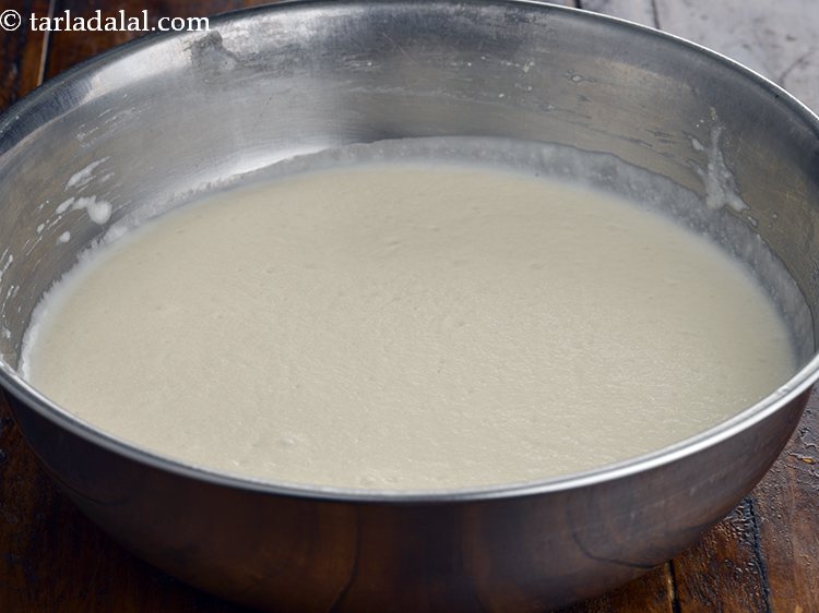 Step 11 – Transfer the mixture of <strong>idli batter of veg stuffed idli recipe | soft stuffed idli …