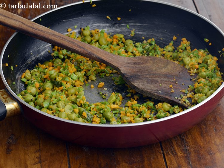 Step 24 – Put approx. 1 tsp of the prepared vegetable stuffing over it.