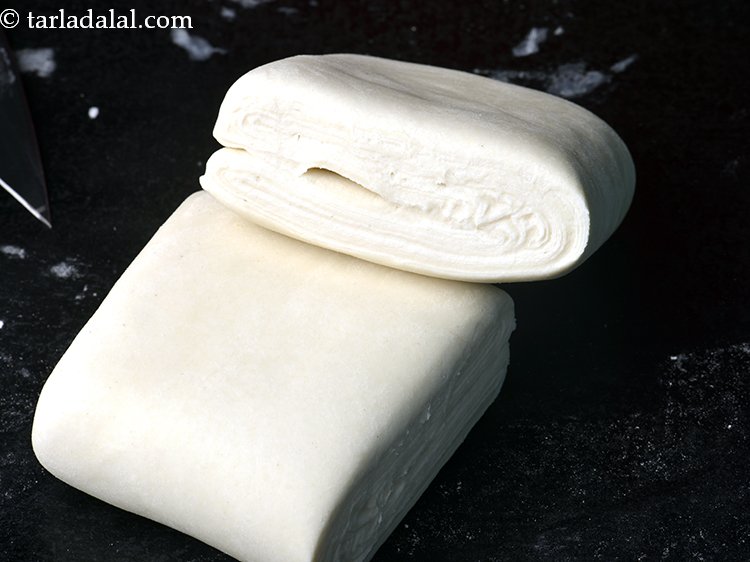 Step 19 – Remove the cling wrap and cut into 2 halves horizontally.