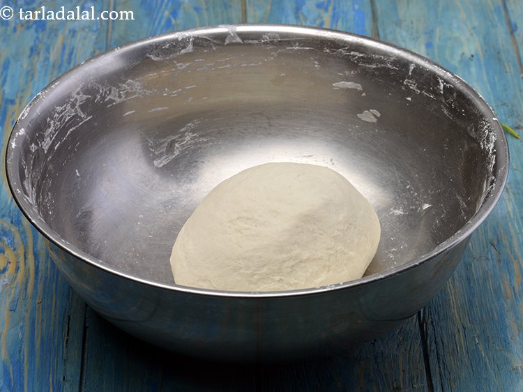 Step 7 – Combine the plain flour, salt, gluten and vinegar in a deep bowl, mix well and …