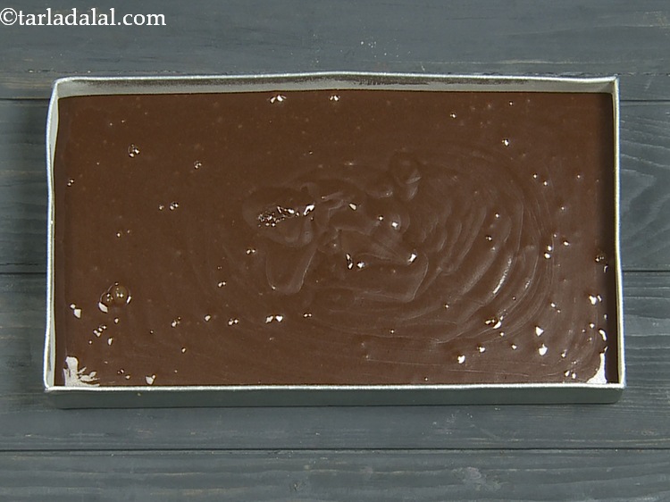 Step 15 – Pour batter into a greased and dusted rectangle aluminium cake tin of 250 mm. (10&rdquo;) …