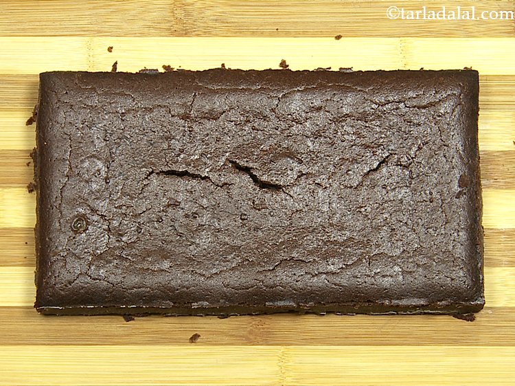 Step 18 – Demould the cake and place on a chopping board.