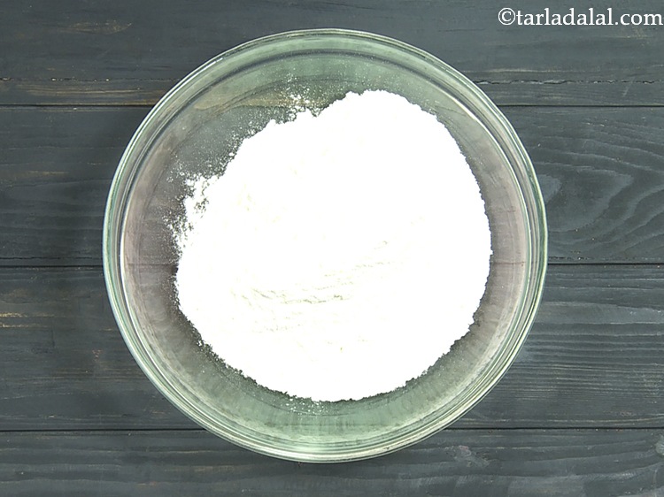 Step 7 – In another deep bowl, take the plain flour.