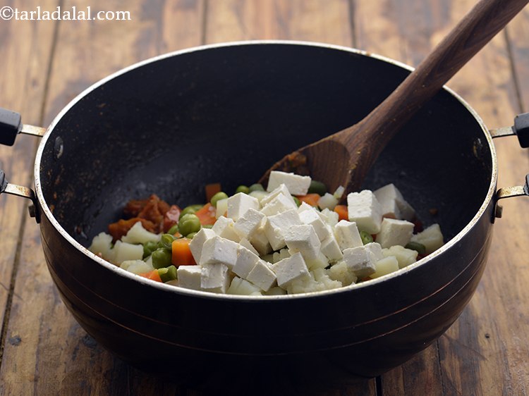 Step 23 – Add the paneer. We have used <a href="https://www.tarladalal.com/Paneer-39276r" target="_blank">homemade fresh paneer</a>
