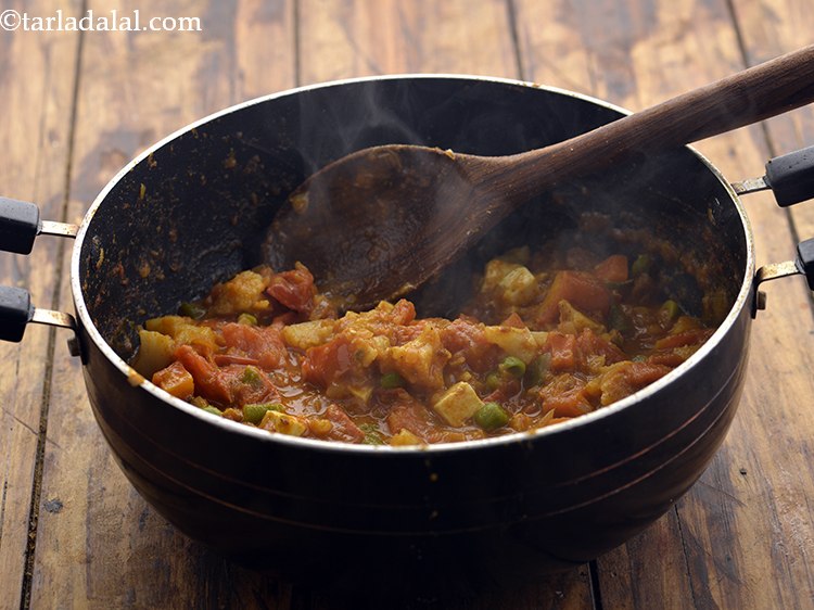 Step 25 – Mix gently and cook on a medium flame for another 2 to 3 minutes, while …