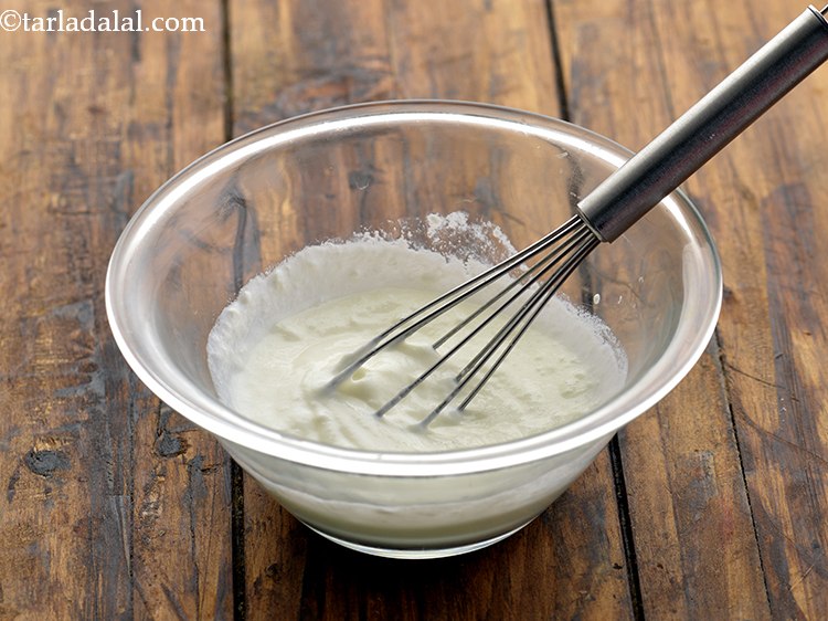 Step 28 – Whisk the fresh curd using a whisk.