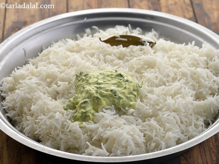 Step 32 – Add the curd-coriander-saffron coloured mixture to the prepared rice.