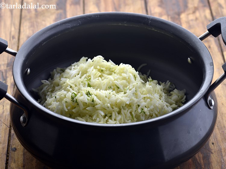 Step 34 – Transfer &frac12; of the rice mixture in a handi.