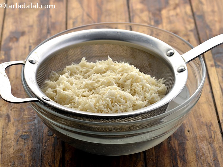 Step 3 – Drain the basmati rice and keep aside.