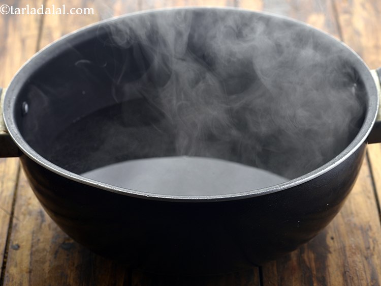 Step 4 – In a deep non-stick pan, add 4&frac12; cups of water and salt. Bring it to …